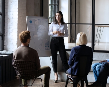 Two employees talking face to face